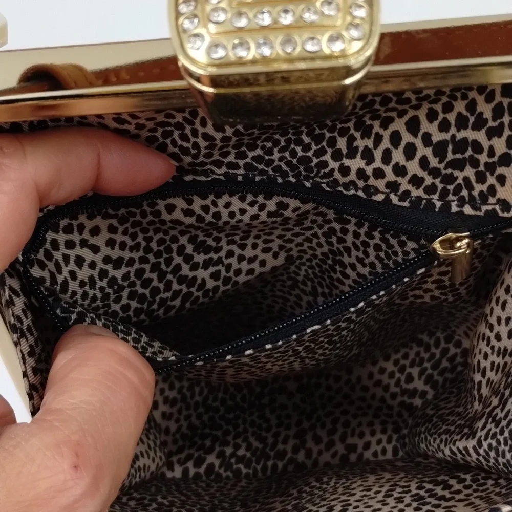 Sophisticated Brown Baby Bag with Gold Accents